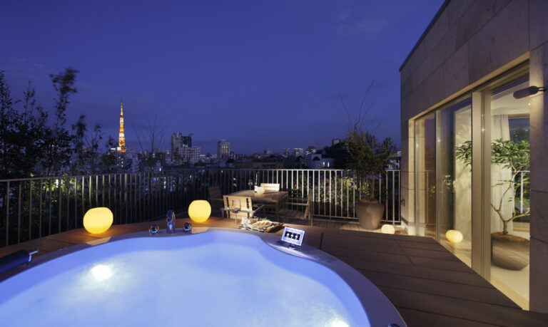 Terrace with jacuzzi at night