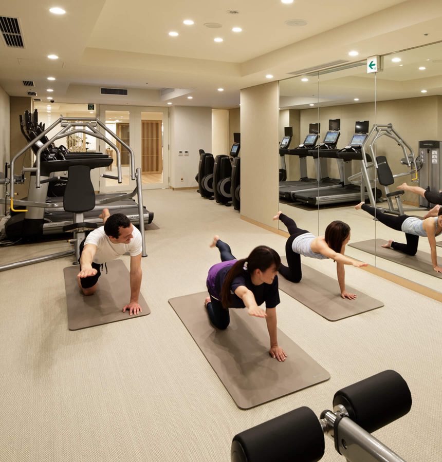Tenants doing Yoga in the gym room